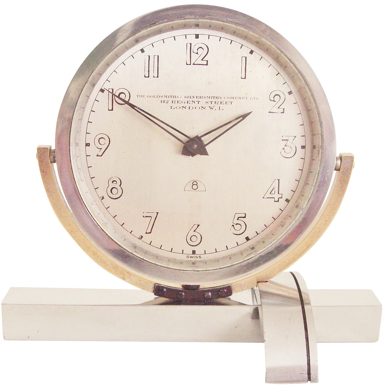 English Art Deco Asymmetrical Chrome and Brass, Mechanical Tilt Shelf Clock For Sale
