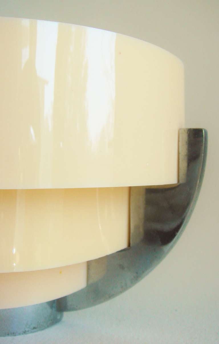 Plated French Art Deco Nickel and Peach Lucite Wall Sconce from 'The Chase' Estate. For Sale