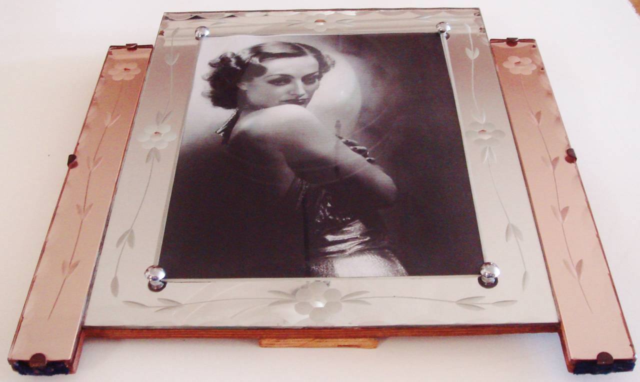This very grand English Art Deco/Mayfair Modern wooden backed and easled large table frame features two columns of amethyst mirror flanking a white mirror photo frame in an Odeon/ziggurat style. Both the white and amethyst mirror are reverse-etched