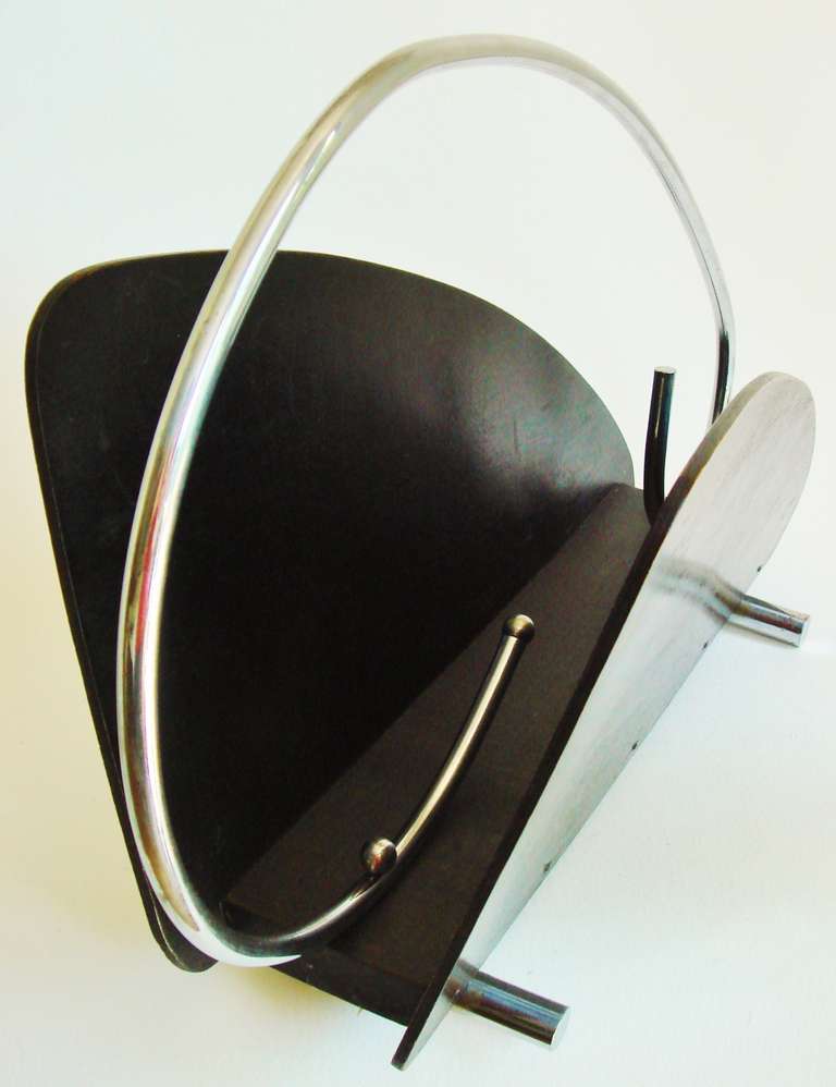 Australian Mid-Century Biomorphic Chrome and Black Stained Wood Magazine Rack. In Good Condition In Port Hope, ON