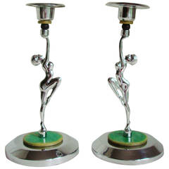 Pair of English Art Deco Chrome & Bakelite Bookended Nude Candlesticks.