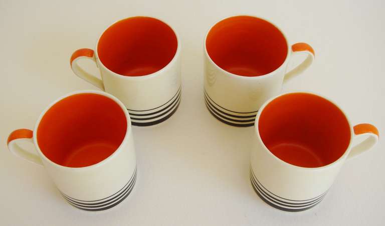 British Four English Art Deco Coffee Can Trios in Orange Tango Pattern by Susie Cooper