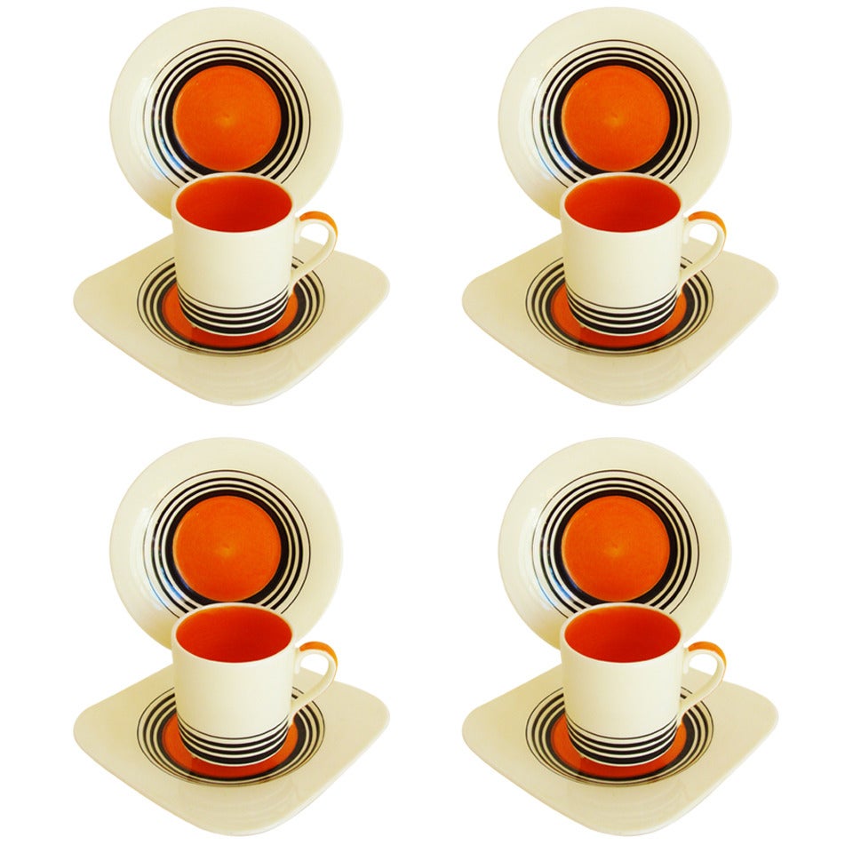 Four English Art Deco Coffee Can Trios in Orange Tango Pattern by Susie Cooper