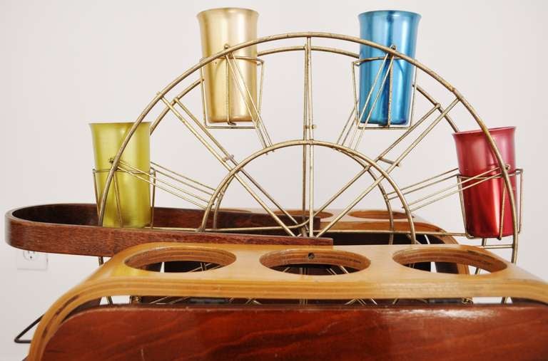Molded Mid-Century Modern American Bar Cart in Plywood with Brass Plated Carousel.