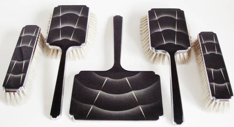 This extremely graphic English Art Deco cloud pattern vanity set features a mirror (9.5