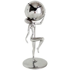 Vintage German Art Deco Chrome-Plated Nude Figurine Holding a Mechanical Ball Clock.