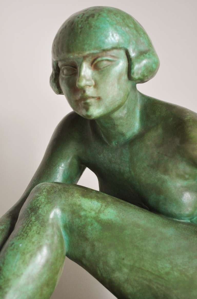 Art déco Grande sculpture française Artful Green Faux Copper Patina Ceramic Seated Nude Sculpture.