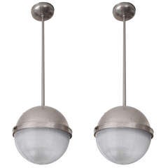 Pair of American Art Deco Machine Age Light Fixtures with Holophane Shades.