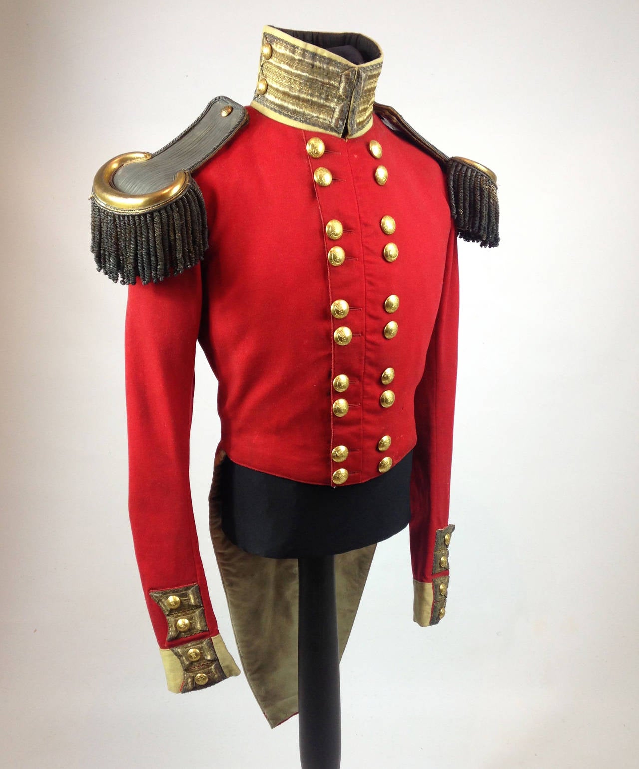 An extremely scarce example of an English officer's coatee to the 67th (South Hampshire) Regiment of Foot.

The tunic of fine scarlet melton cloth and yellow facings is in incredibly good, bright condition for its age despite some light staining