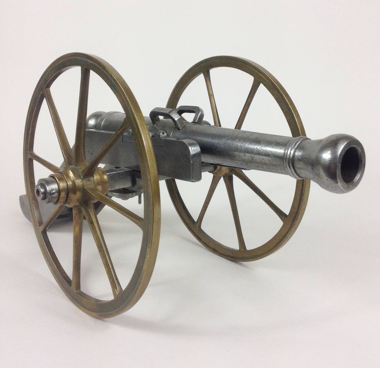 A wonderful museum quality model of a Napoleonic cannon.

Constructed of cast iron with bronze wheels. The Napoleonic crown and 'N' engraved to the barrel top by the touch hole.

A rare, superb example of substantial scale and weight.