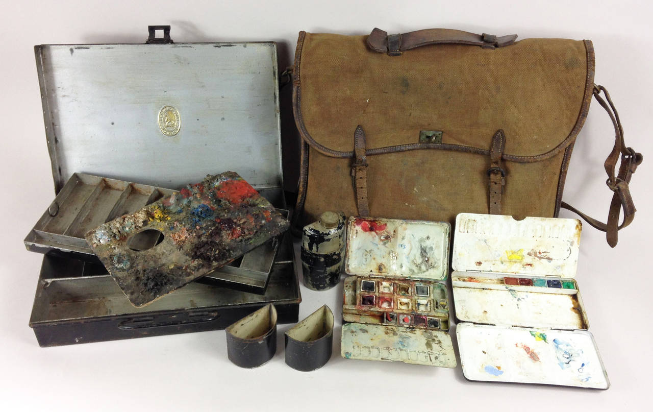 A wonderful early 20th century artist's satchel by Reeves & Sons of London.

Contained inside the canvas and leather bag are four tins. Consisting of a large box with removable tray, two smaller paint boxes and water flask. Also included is a very