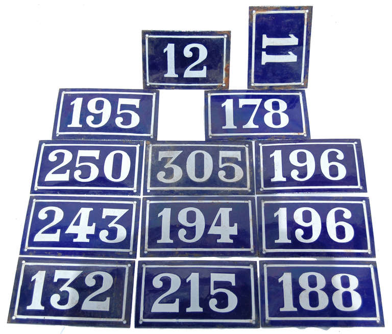 A lovely collection of vintage French enameled metal door numbers.<br />
The price is for the whole group of 13. The size below is the approximate measurement of one plate.