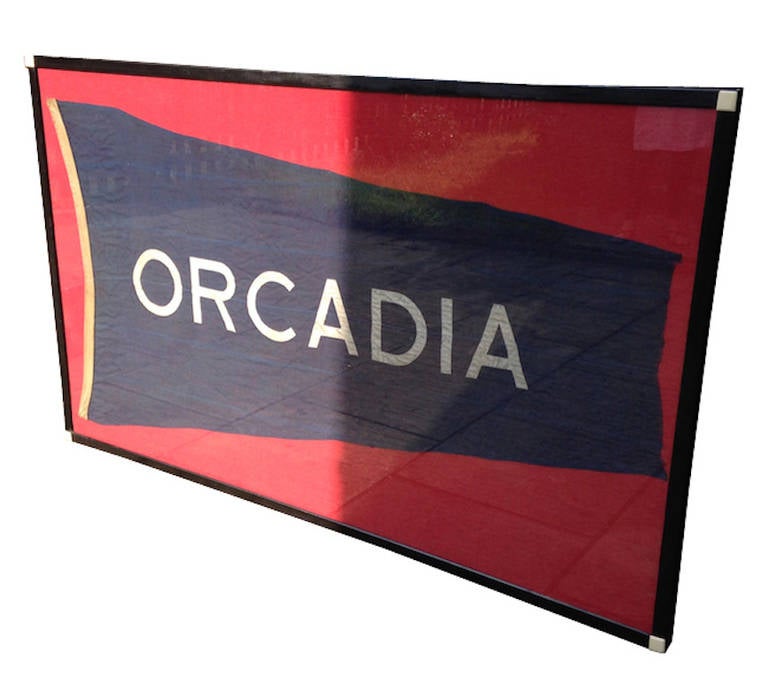 A fantastic, very decorative ships pennant the 'Orcadia'. 

Please take great care when checking the dimensions of this item as it's incredibly large. Hand made frame with reinforced glass front. Mounted on acid free hessian. The pennant is in