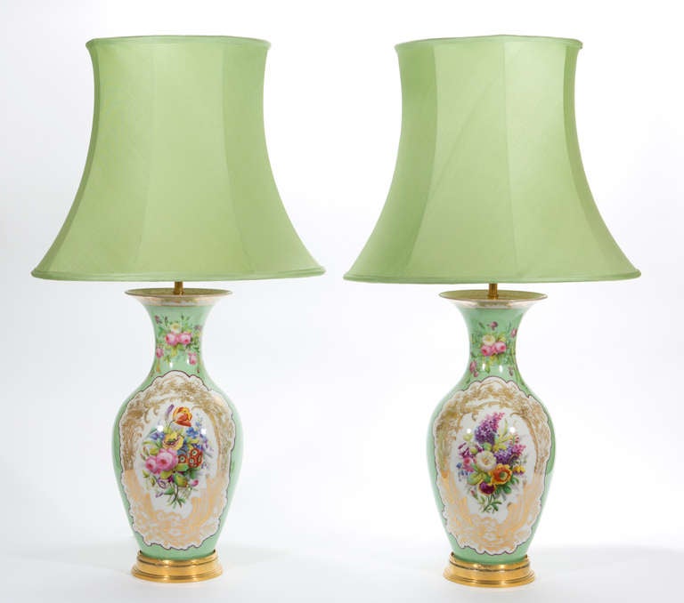 A Pair of porcelain Vases as Lamps, Eau-de-Nile ground colour: French, circa 1840