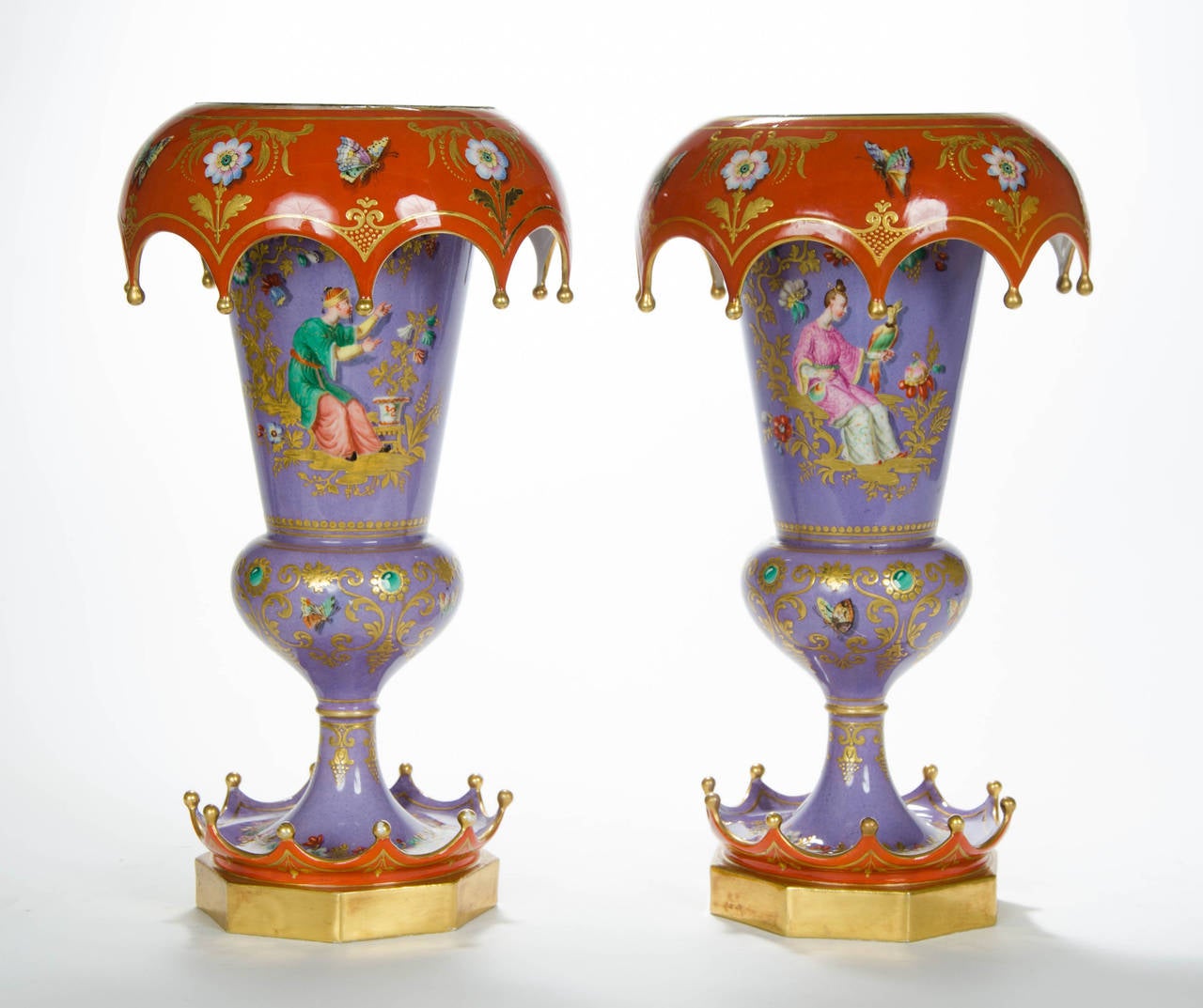 A rare and unusual pair of Chinoiserie vases in lavender and iron-red ground color, decorated with Chinoiserie figures, exotic birds, garlands of flowers, fruit and butterflies, French, circa 1840.