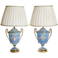 A Pair of Wedgwood Vases as Lamps with ormolu handles and bases