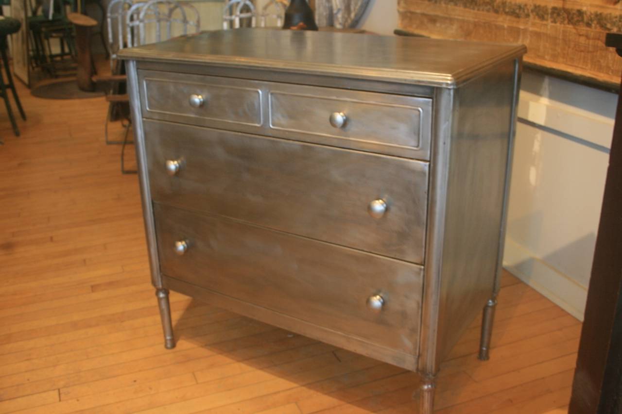 Great steel dresser by Simmons c.1930's.  There is some nice detail on the legs. Very well made. It has four nice wheels as well but not pictured, that give the dresser about an 1 1/2