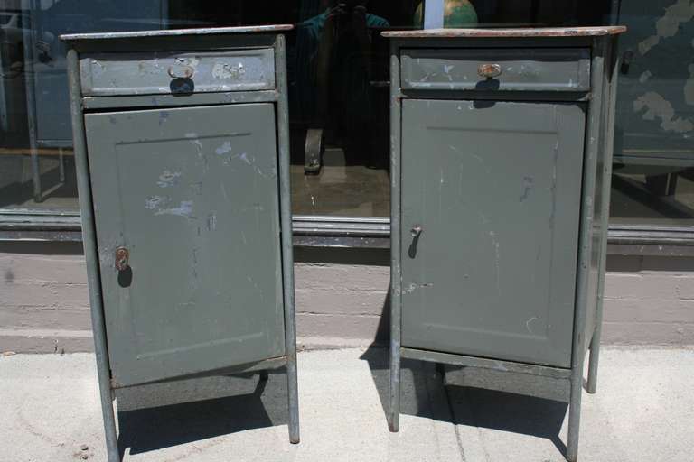 These are a pair of elegant industrial nightstand size cabinets. I left the gray paint and areas surface rust, though stripped to the bare steel they would look very good.  I have 2 pair of these. Each have a drawer and shelves inside cabinet door.
