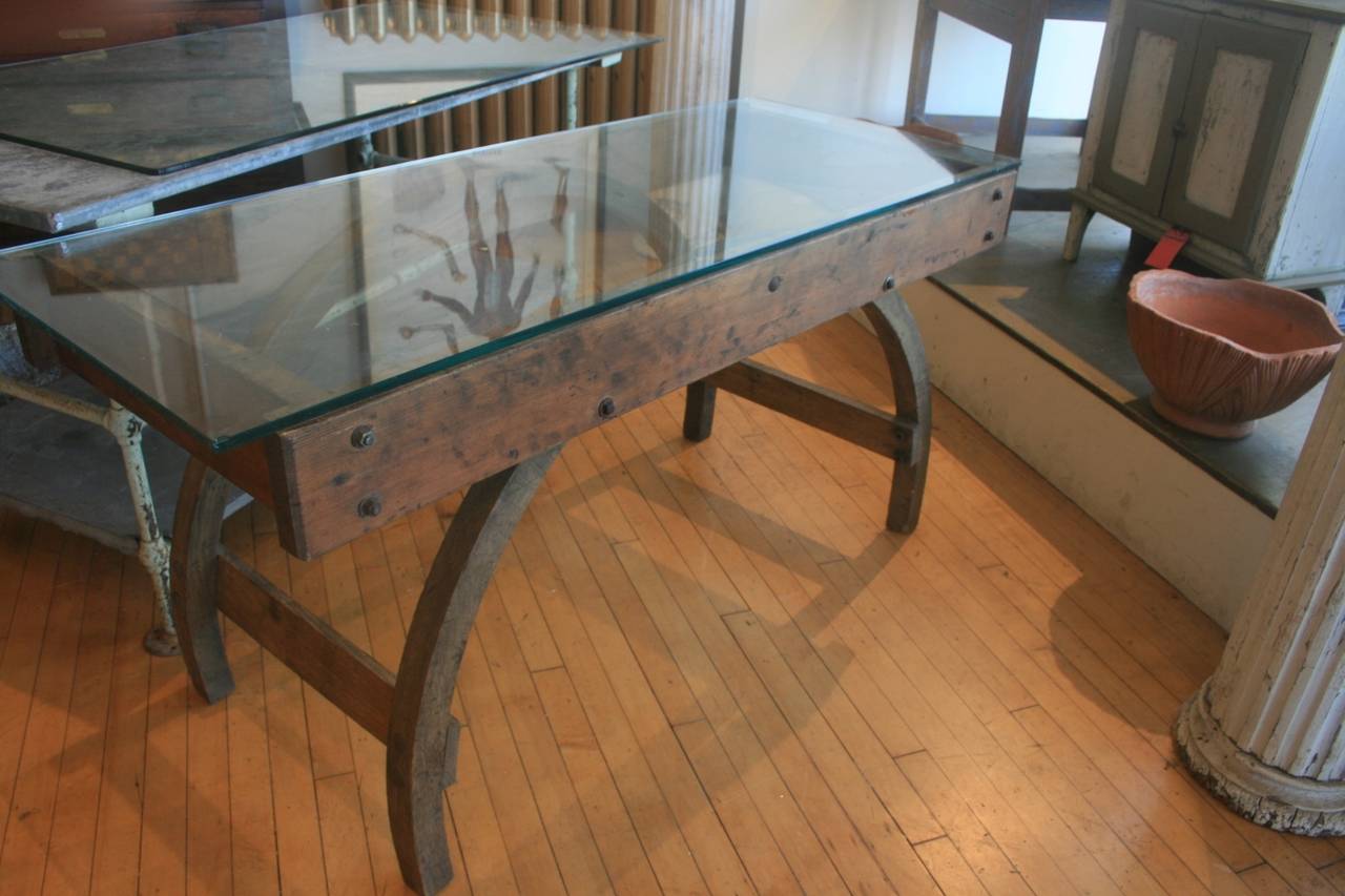 Beautiful and unusual wood and glass desk made from window arches, c. 1930.  Looks like this must have been designed by an architect, but the maker is unknown.