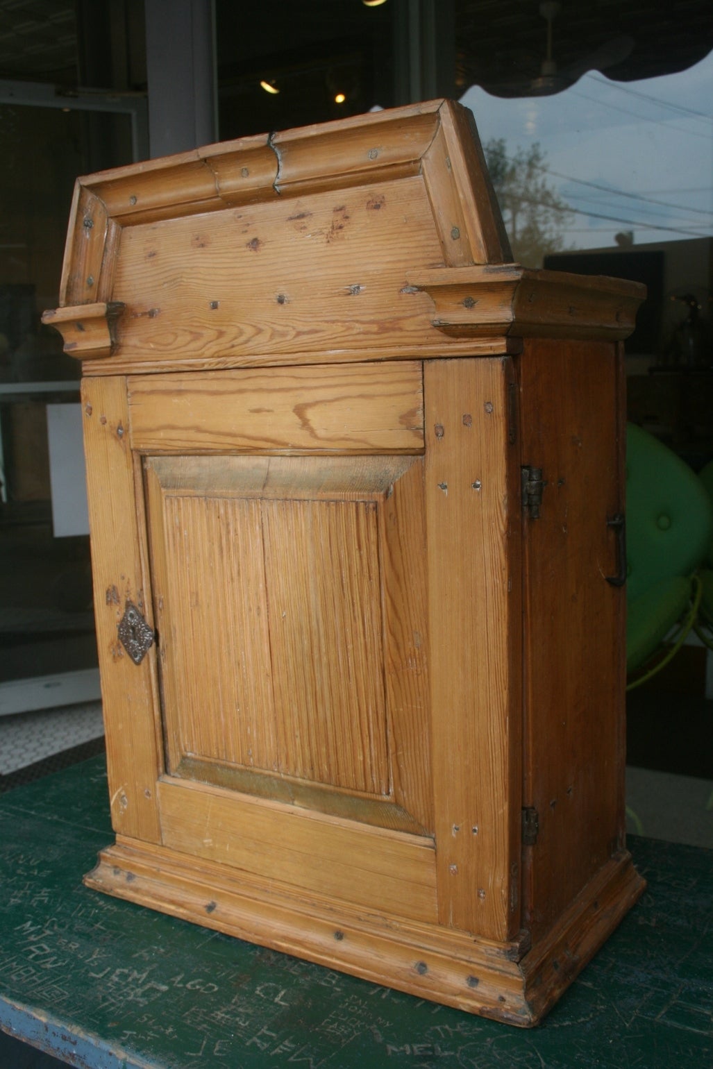 18th century Finnish Country wall cabinet. This cabinet has a beautiful patina and unique home made design. The hinges are simple and hand-forged, and attached with home forged nails. This cabinet could have lots of uses but it's beautiful just as