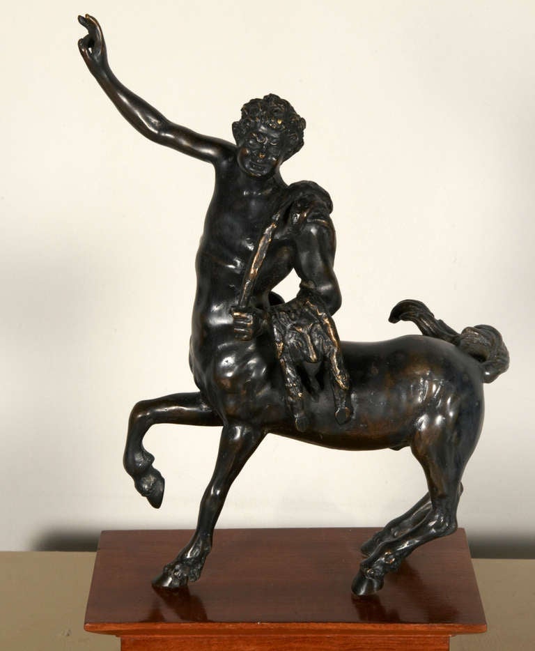 Pair of Italian Grand Tour bronze sculptures. The bronzes are on a wood base, and they are one of the rare replicas of the Furietti centaurs discovered by Giuseppe Alessandro Furietti in Tivoli in 1736.
They represent an allegory of the feeling of