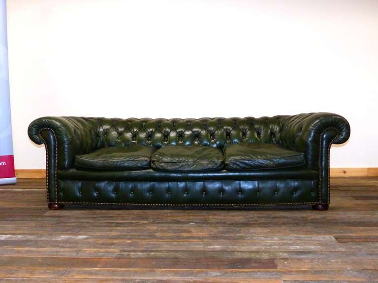 Circa 1900, this superb four seater vintage Chesterfield is exceptionally well made, complete with fully coil sprung seat, arms and back. It's over a century in age and is truly a Chesterfield for life, this luxurious piece has been well cared for