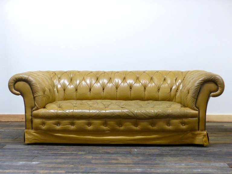 A fabulously crafted vintage tan Chesterfield sofa, circa 1870 with some lovely antique features.

This piece is well over 140-years-old and is in remarkable condition throughout. It's fully coil sprung, as most pieces of this era were, and it is