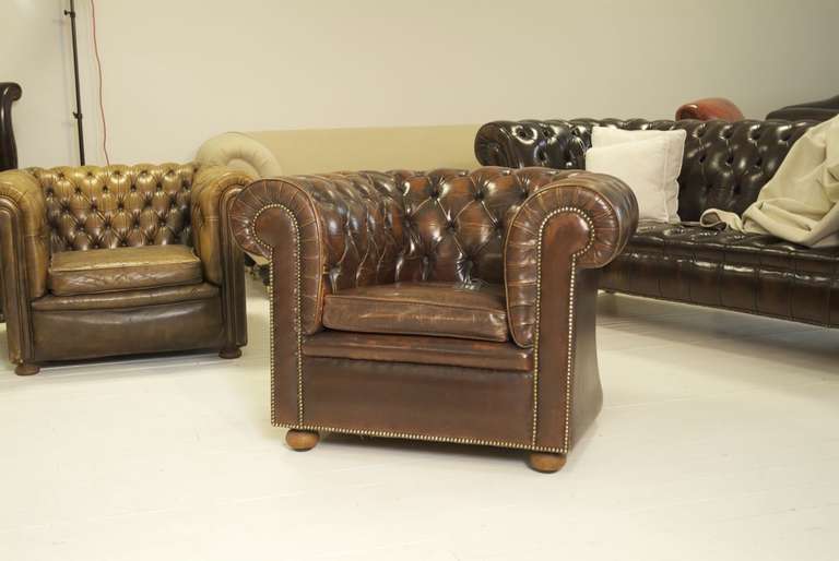 Very good mid-century gentleman's club chair.

A lovely vintage piece with the most beautiful patinated hand dyed finish.