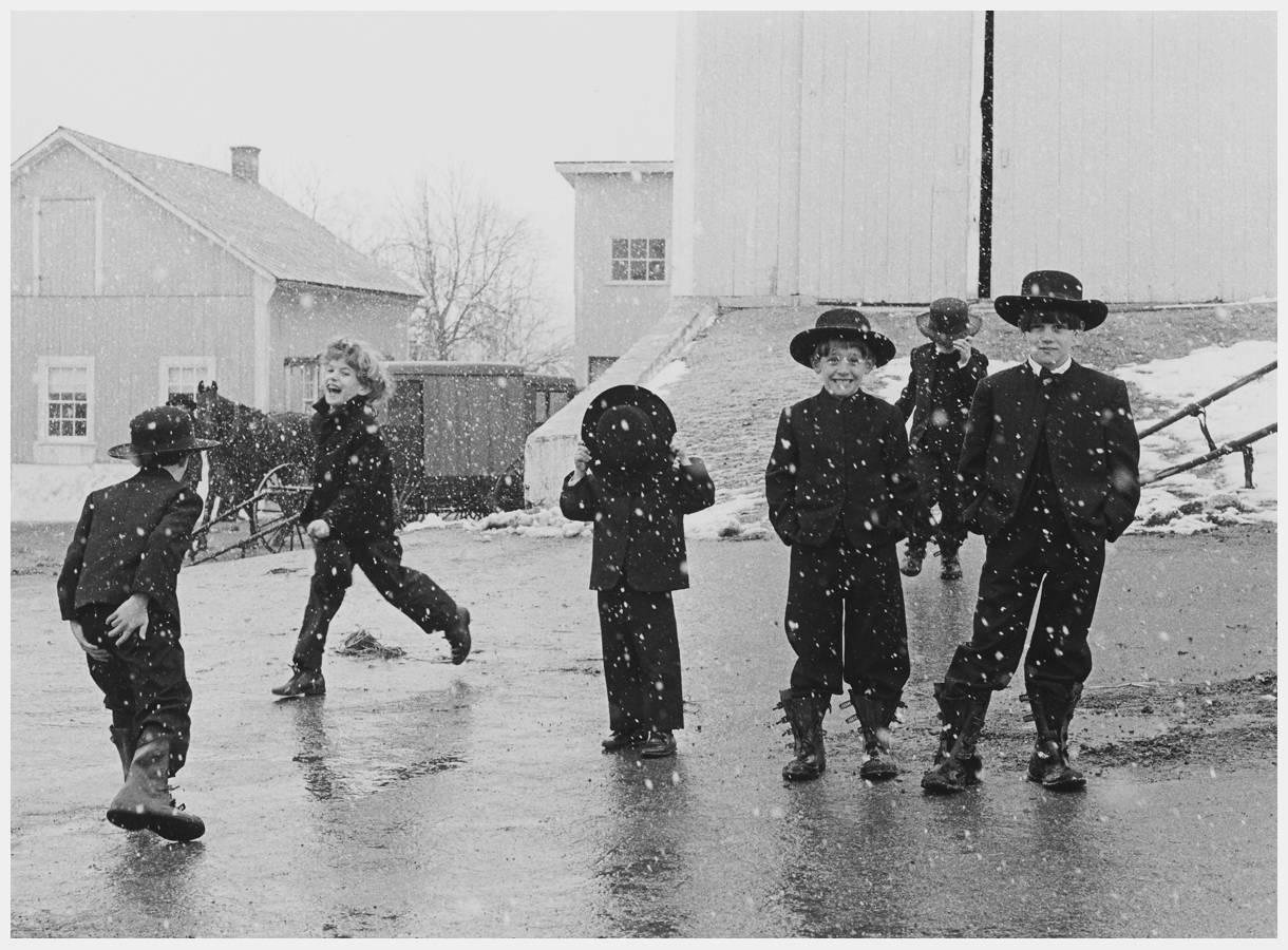 Amish Children Playing in Snow, Lancaster, Pennsylvania - Photograph by George Tice