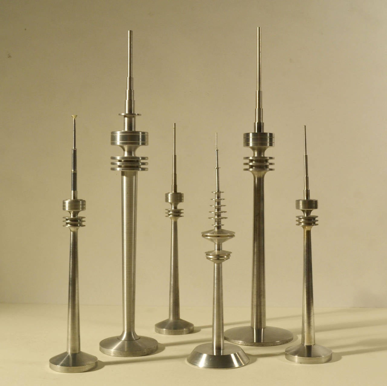 Scaled models of television tower models hand spun in aluminium.
Their heights vary from 45-30 cm.
The towers can be sold individually.