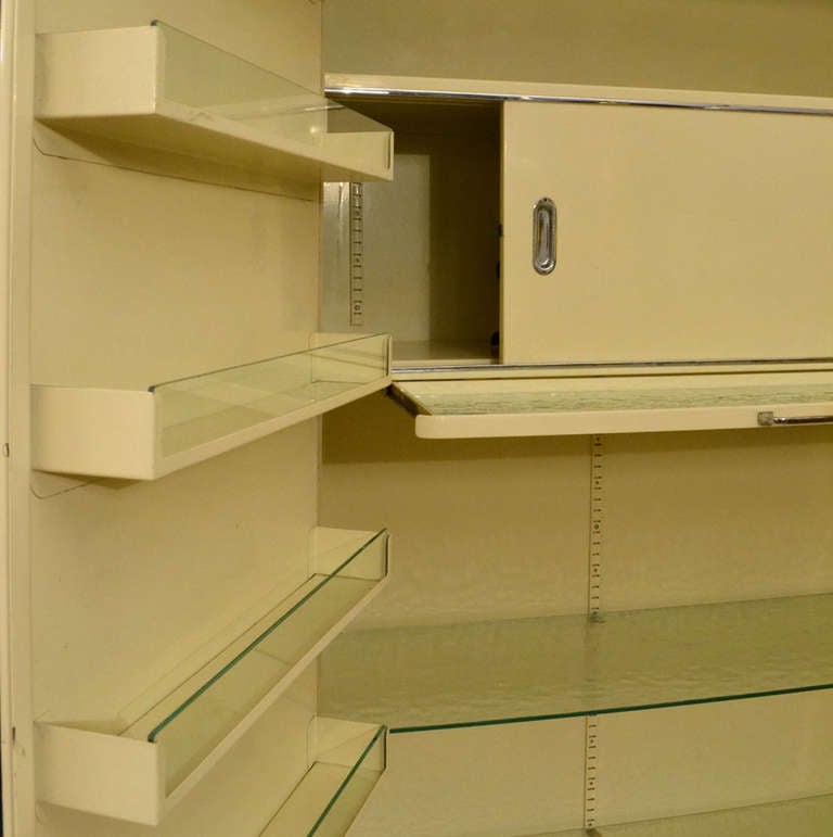German Pair of 1930s Modernist Industrial Cream Metal Pharmaceutical Storage Cabinets