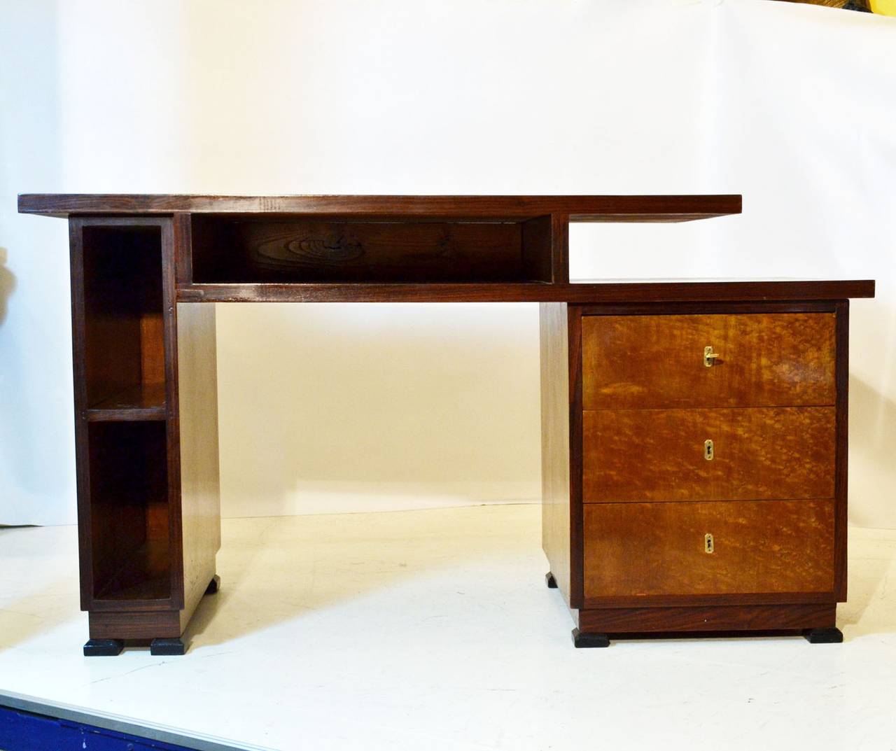 This burl figured Walnut desk is edged with  Magassar wood veneer. A good example of 'Rationalism' in Italian design of the 1920-30's.