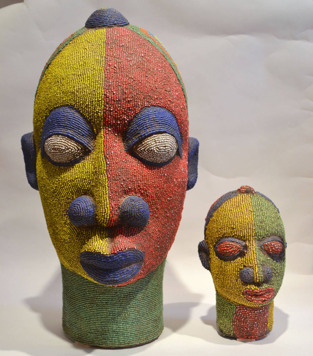 Mid-Century Modern Nigerian Beaded Female Head Sculpture in Yellow, Green and Red