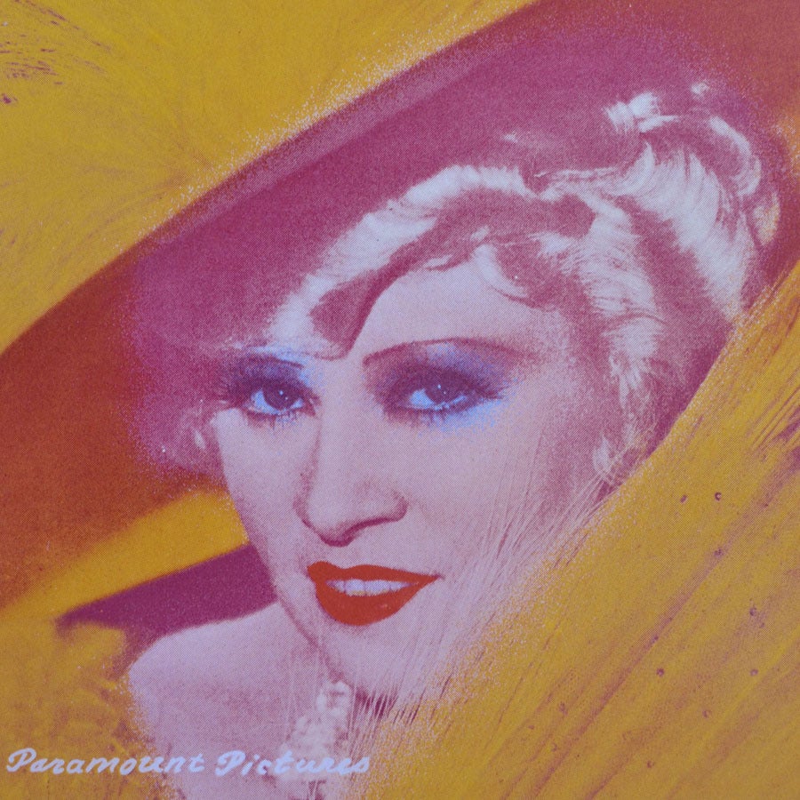 Original limited edition screen-print 13/25 of Mae West in Pop Art style, framed in a white wooden frame.