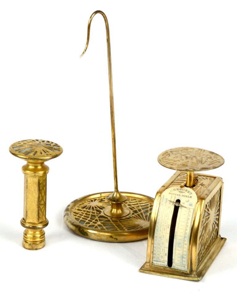 A glass and gilt bronze scale, stamp, and note stand stamped Tiffany Studios.