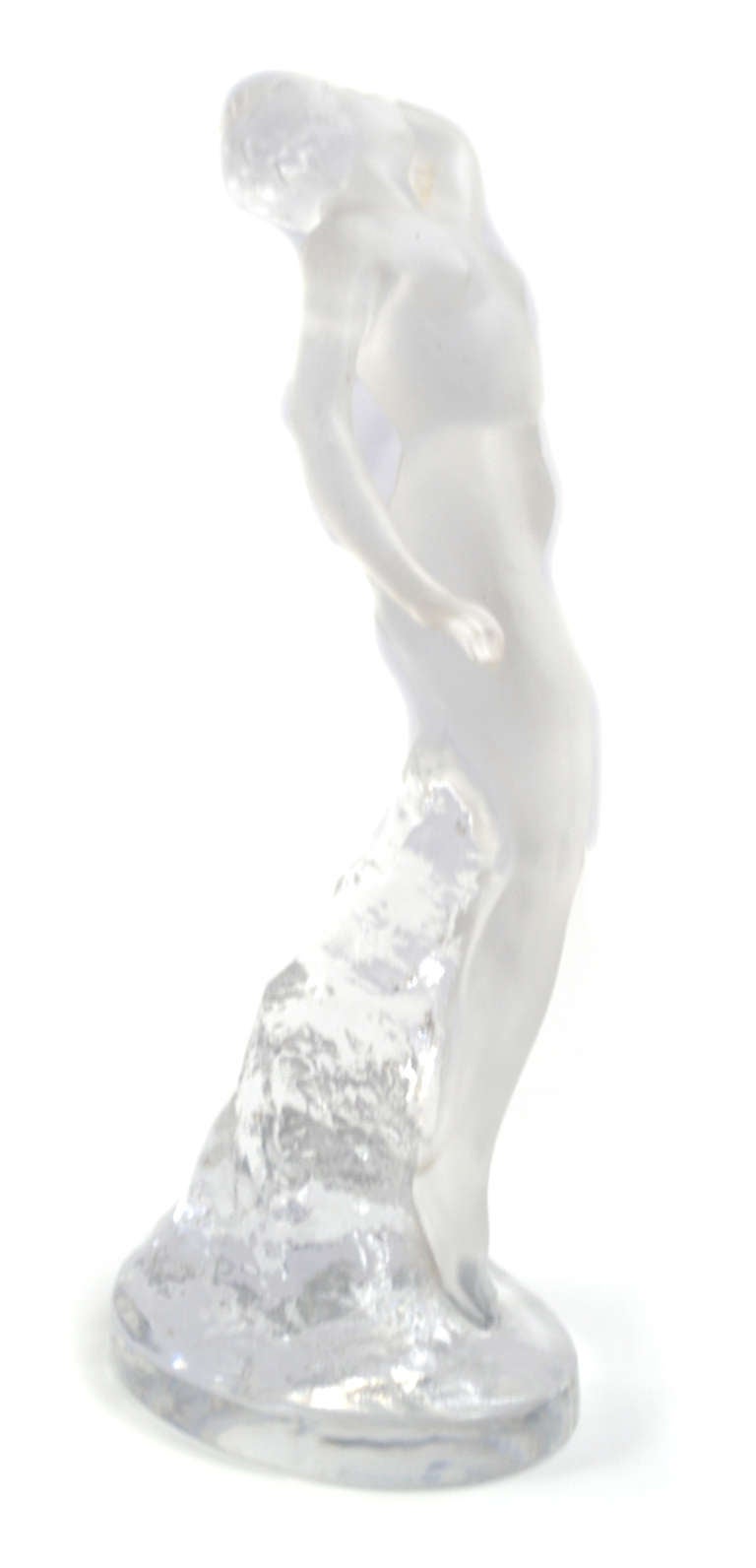 A frosted and clear glass statue of a nude woman, signed 