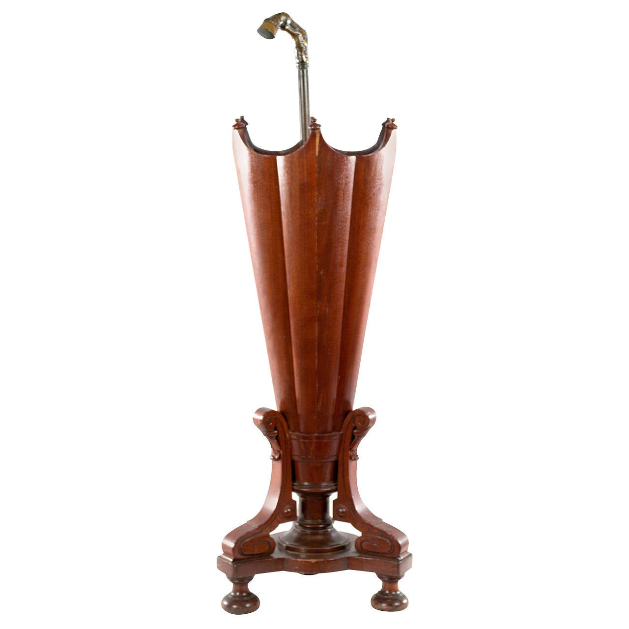 A bronze and mahogany umbrella and cane stand at 1stDibs
