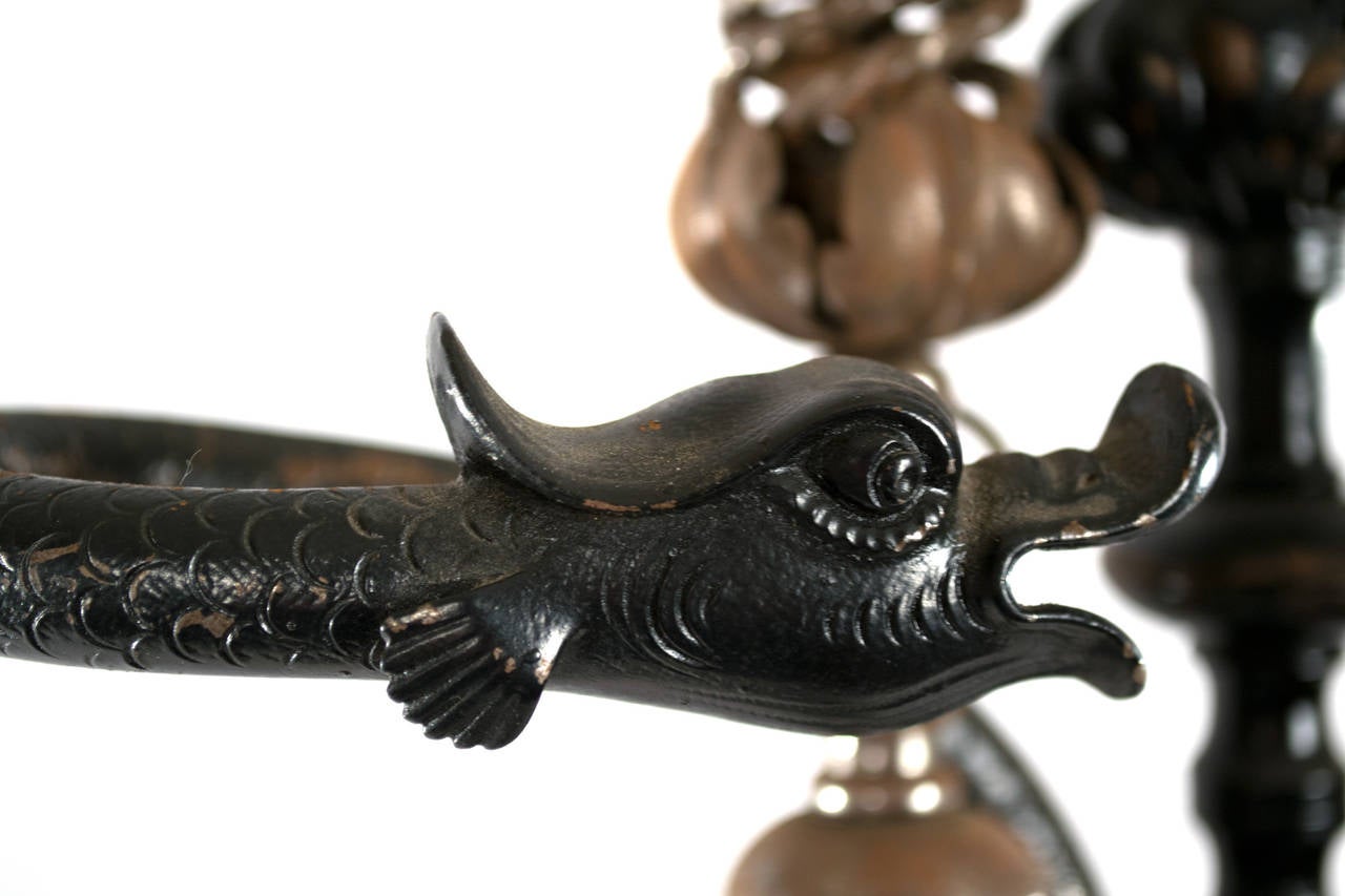 19th Century A French Wrought Iron Fireplace Tool Set with Sculpted Dolphins