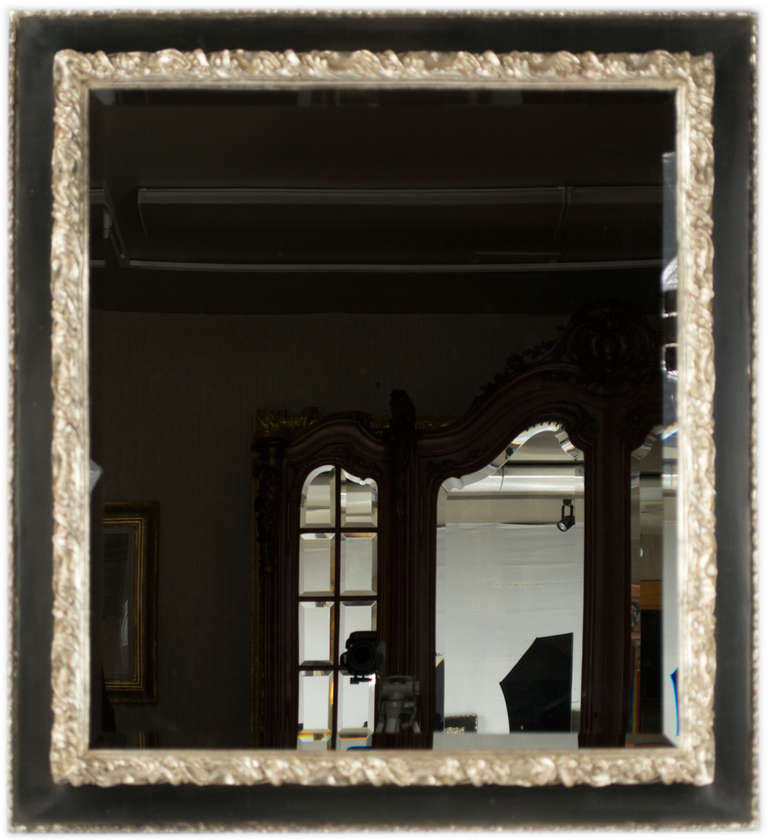 Baroque Silvered and Ebonized Bevelled Mirror For Sale