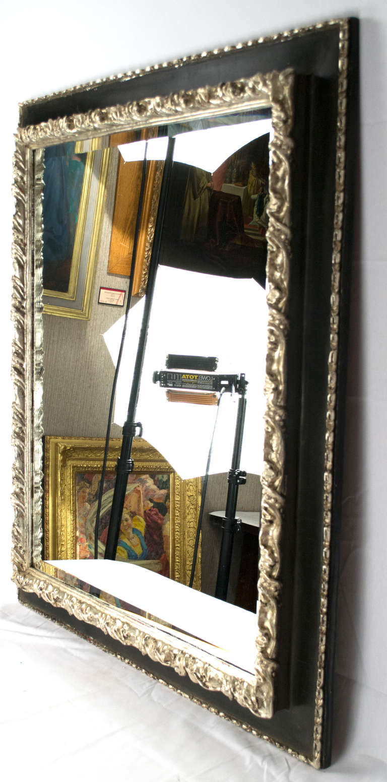 American Silvered and Ebonized Bevelled Mirror For Sale