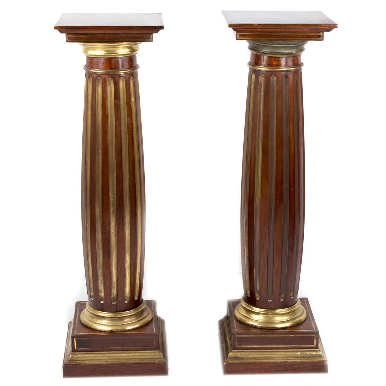 A Pair of English Mahogany, Gilt and Ormolu Pedestals