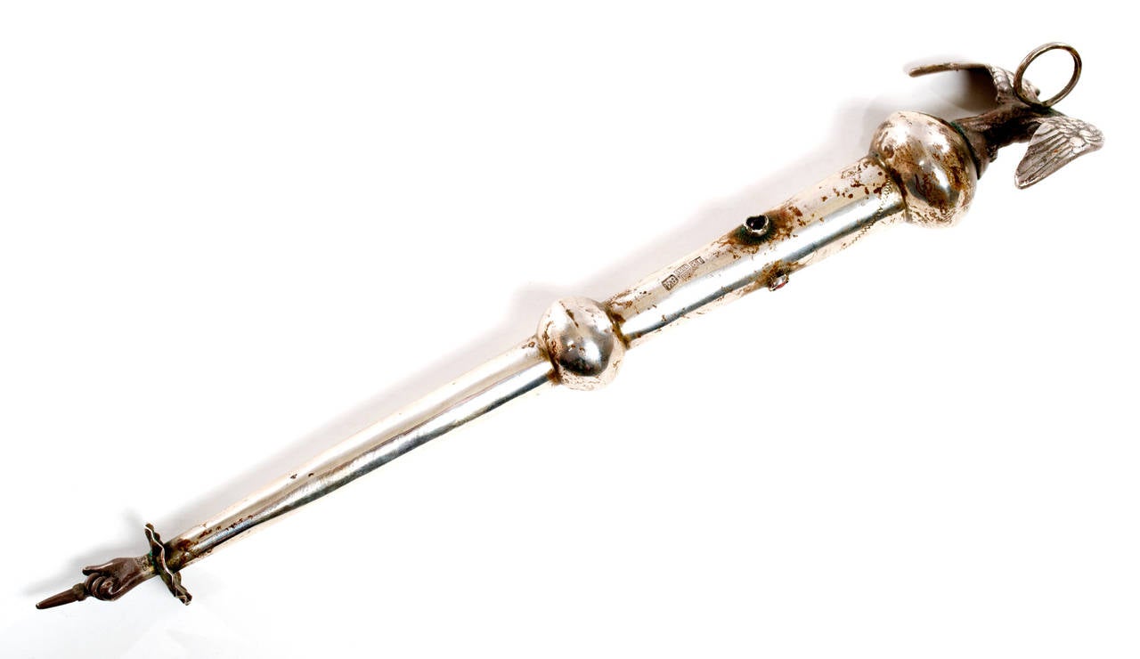 A continental silver-plate yad torah pointer marked 