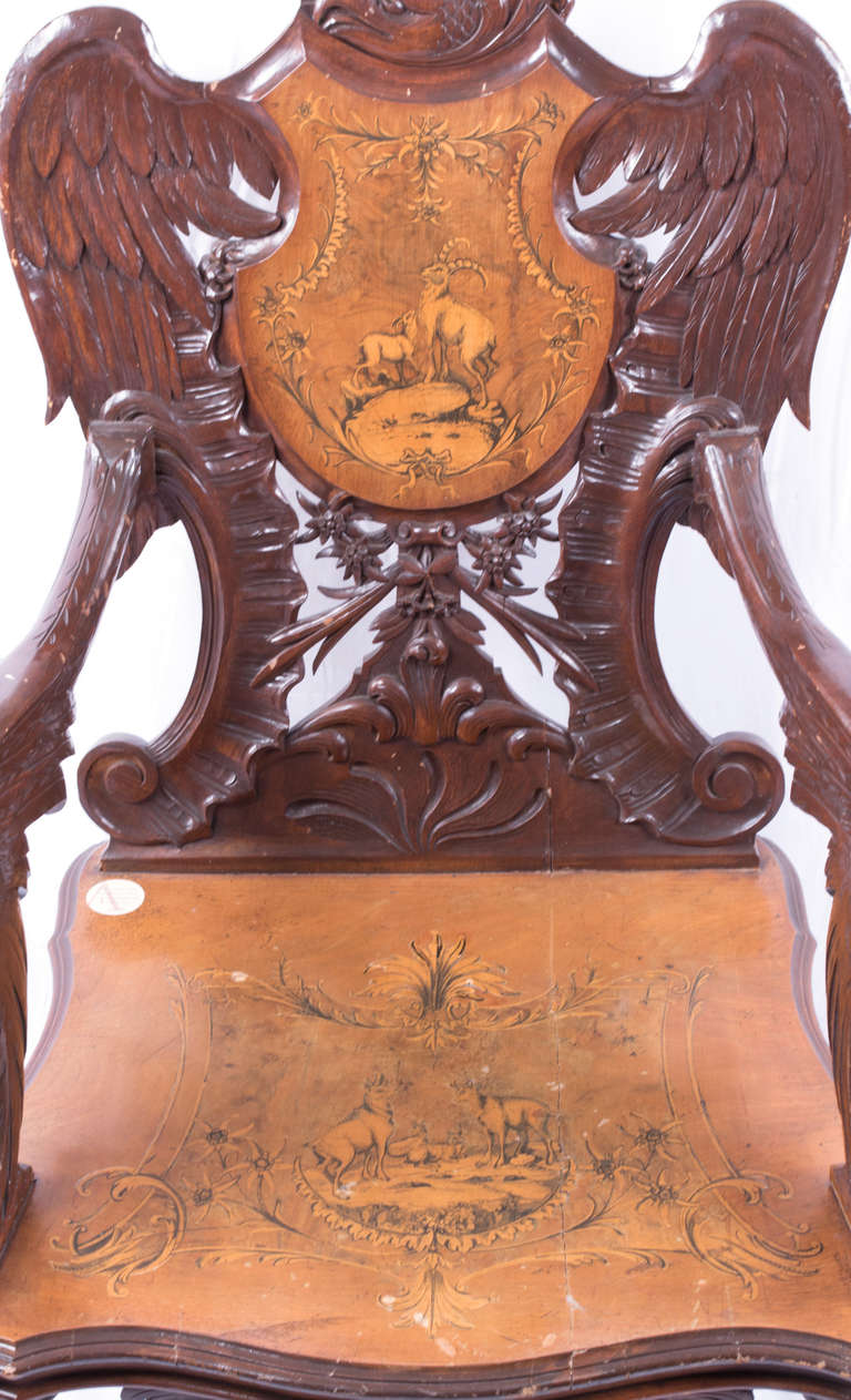A Black Forest Carved Walnut and Fruitwood Armchair In Good Condition For Sale In Salt Lake City, UT