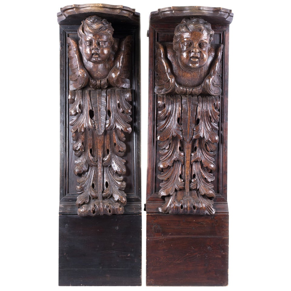 Pair of Monumental Carved Putti Corbels