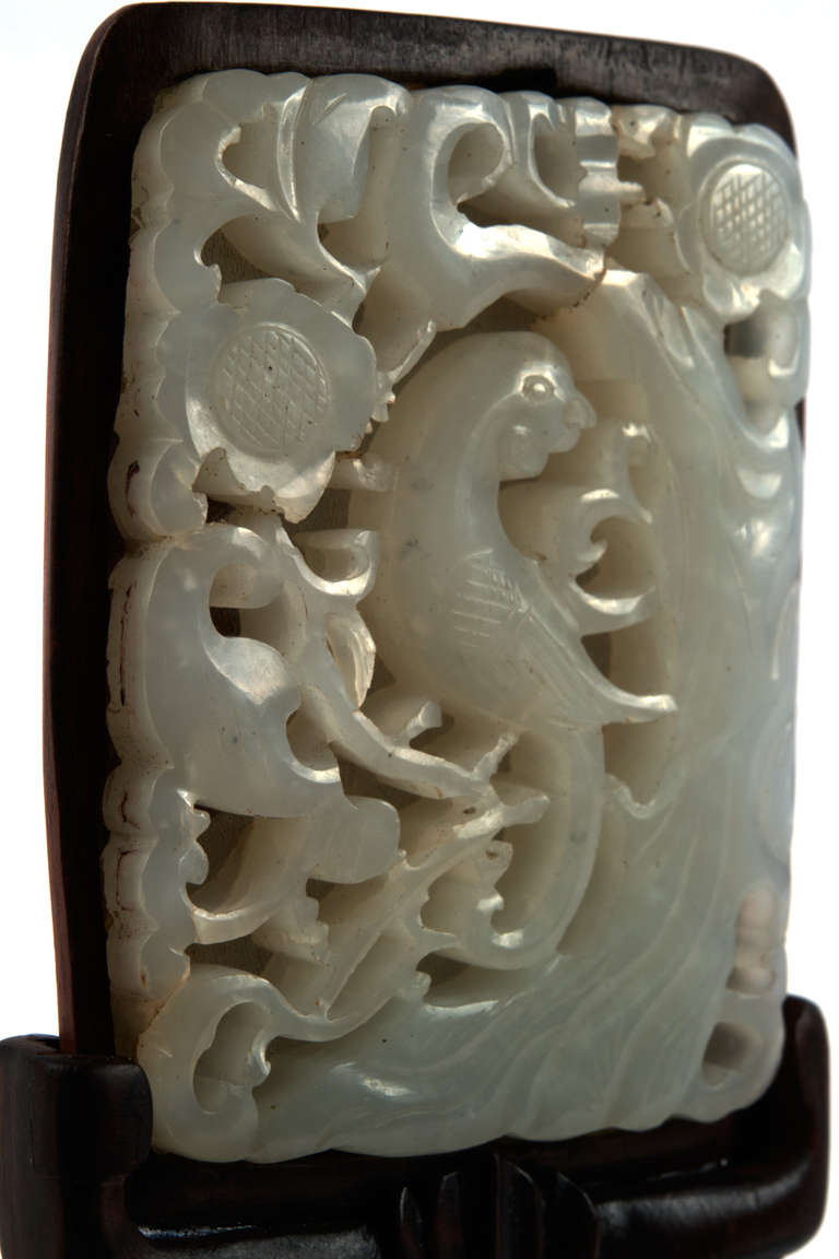 Carved A Qing dynasty carved jade plaque with stand