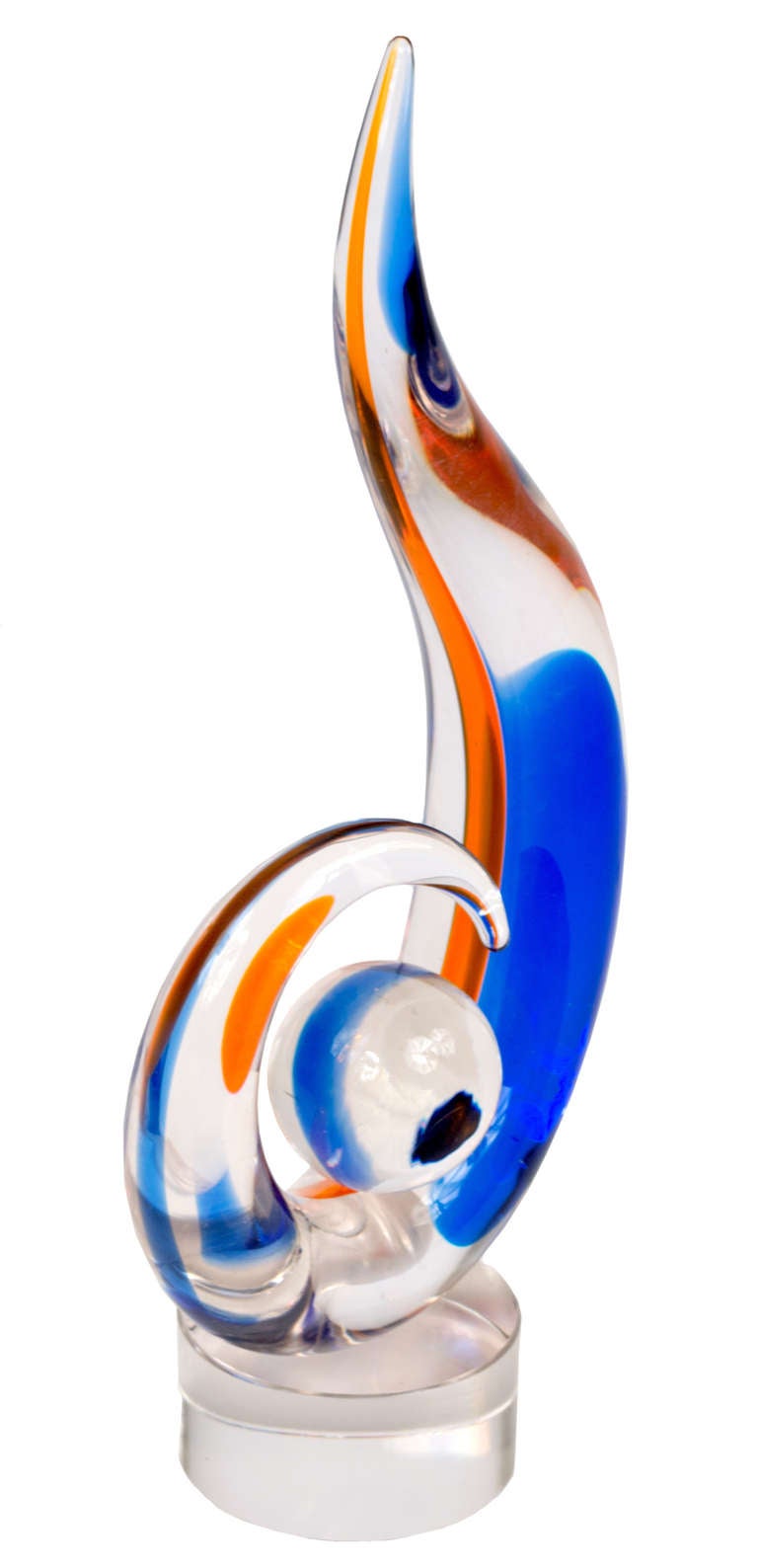 This beautiful hand blown Murano glass piece features blue and orange flourishes and a smooth, elegant design affixed to a glass pedestal and signed by 