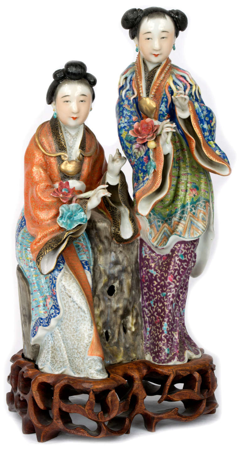 Chinese A porcelain group of famille rose ladies