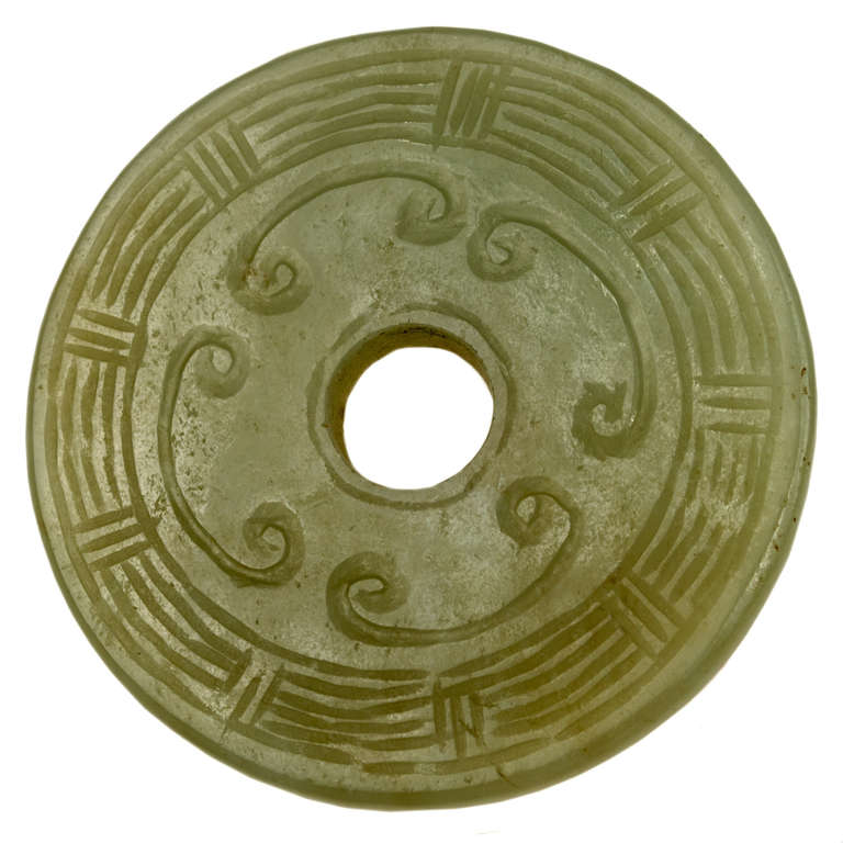 Chinese Carved and Pierced Celadon Jade Disc on Stand