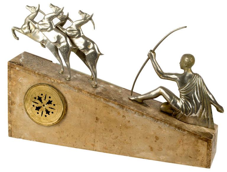 This work, with its idealized figures of Diana the Huntress chasing a flock of deer is very much in the spirit of of Paul Manship. The figures are silvered bronze and sit atop an inclined pediment, made of rose onyx.