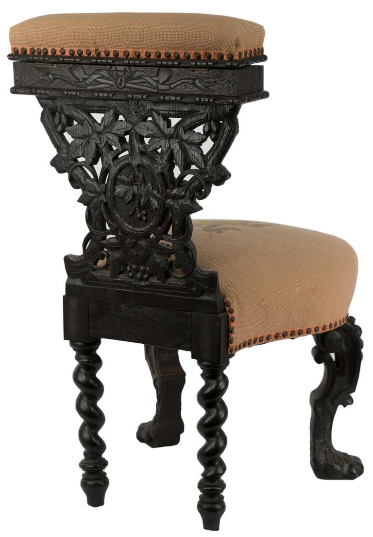 Ebonized Smoking Chair with Elaborate Carving at 1stDibs